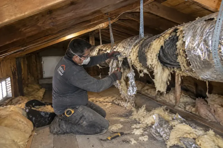 Attic flex duct replacement, in progress: Removing the damaged duct run.