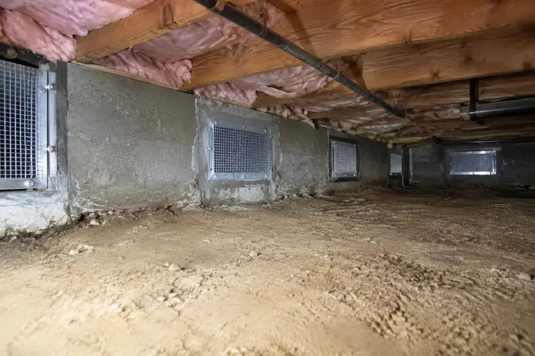 Crawl space rodent proofing, after: Every vent screened and sealed, and the crawl space cleared.